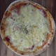 pizza romaine au jambon et au fromage dans votre restaurant le savoyard à Bouaye 44